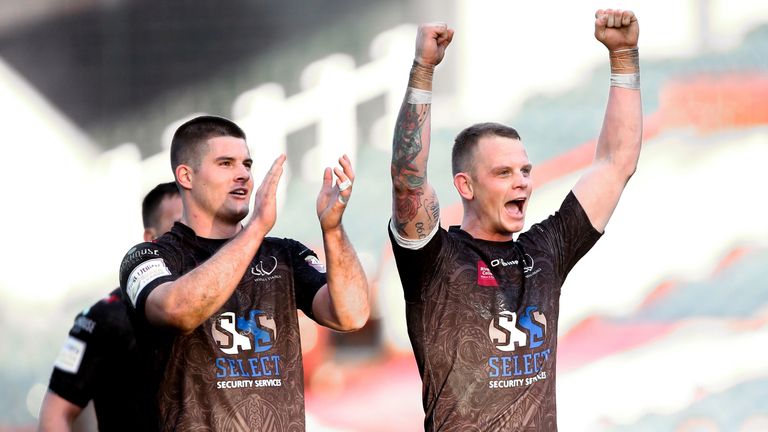 Widnes captain Kevin Brown (R) and Charly Runciman (L) celebrate the win.