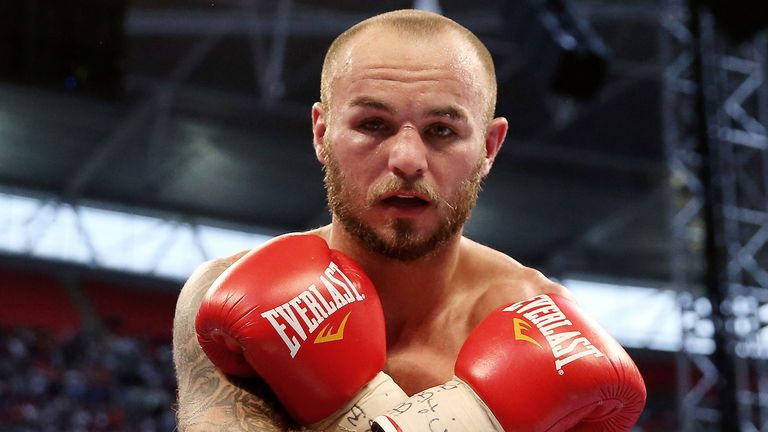Kevin Mitchell celebrates his victory over Ghislain Maduma 