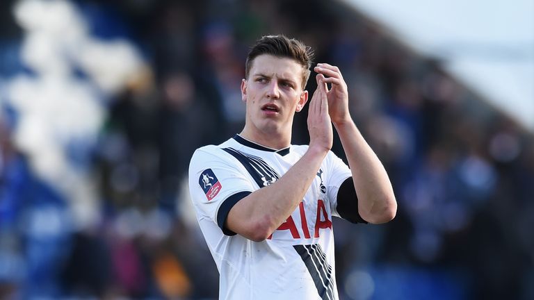 Kevin Wimmer of Tottenham Hotspur applauds the away supporters