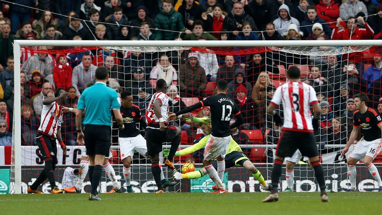 Sunderland's Lamine Kone (left centre) heads the ball in-off Manchester United goalkeeper David De Gea to score their second goal