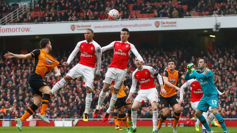 Laurent Koscielny of Arsenal heads the ball during the Emirates FA Cup fifth round match between Arsenal and Hull