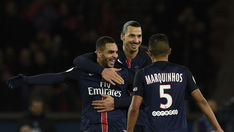 Layvin Kurzawa (centre) is congratuled by Zlatan Ibrahimovic and Marquinhos after scoring against Lorient
