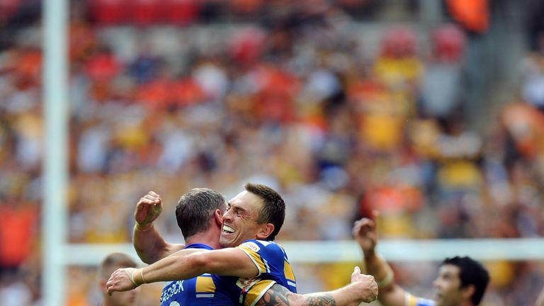 Leeds Rhinos' Kevin Sinfield hugs Jamie Peacock at Wembley