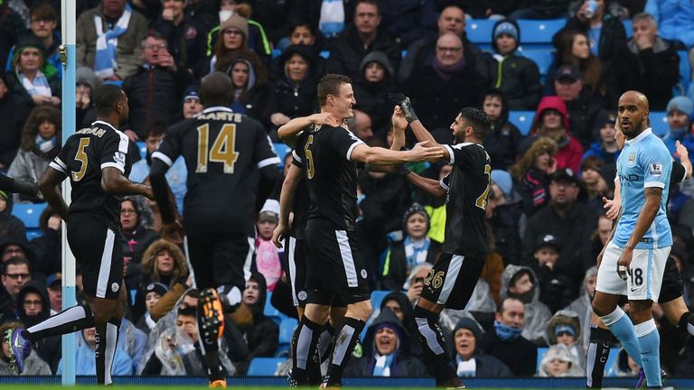 Robert Huth (3rd L) of Leicester City celebrates scoring his team's first goal