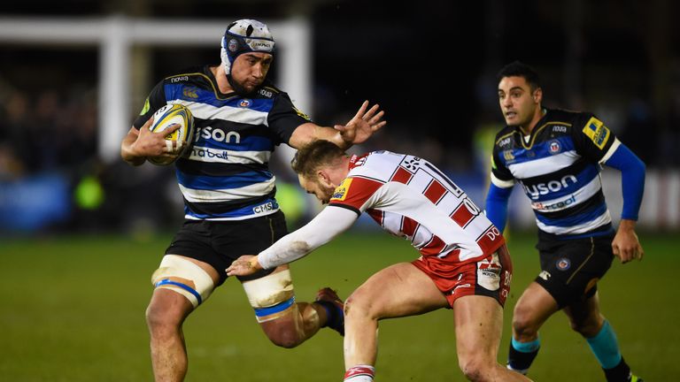 Leroy Houston of Bath is tackled by Bill Meakes of Gloucester