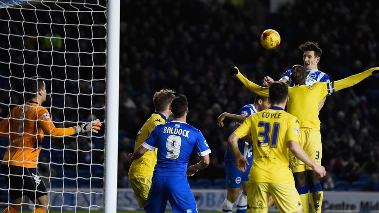 Lewis Dunk heads in Brighton's fourth goal
