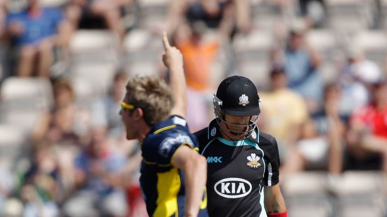 SOUTHAMPTON, ENGLAND - AUGUST 19:  Kevin Pietersen of Surrey walks off after being dismissed first ball as Liam Dawson of Hampshire celebrates during the C