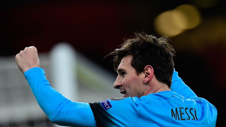 Barcelona's Argentinian forward Lionel Messi celebrates scoring his team's first goal during the UEFA Champions 