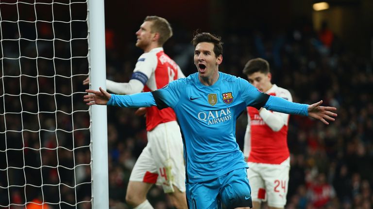 Lionel Messi of Barcelona celebrates scoring the opening goal 