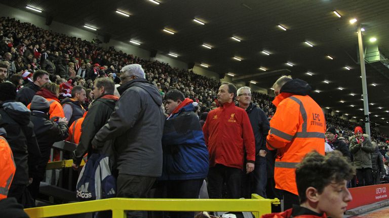 Liverpool supporters walk out in the 77th minute of a 2-2 draw with Sunderland in a protest against ticket prices