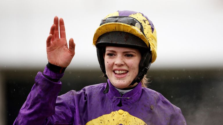 Lizzie Kelly celebrates after riding Agrapart to win The Betfair Hurdle Race at Newbury racecourse on February 13, 2016 in Newbury