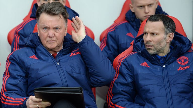 Manchester United's Dutch manager Louis van Gaal (L) and Manchester United's Welsh assistant manager Ryan Giggs