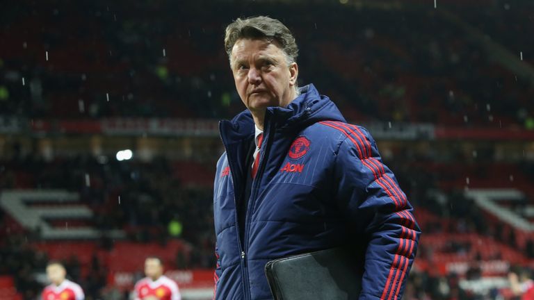 Manager Louis van Gaal of Manchester United walks off