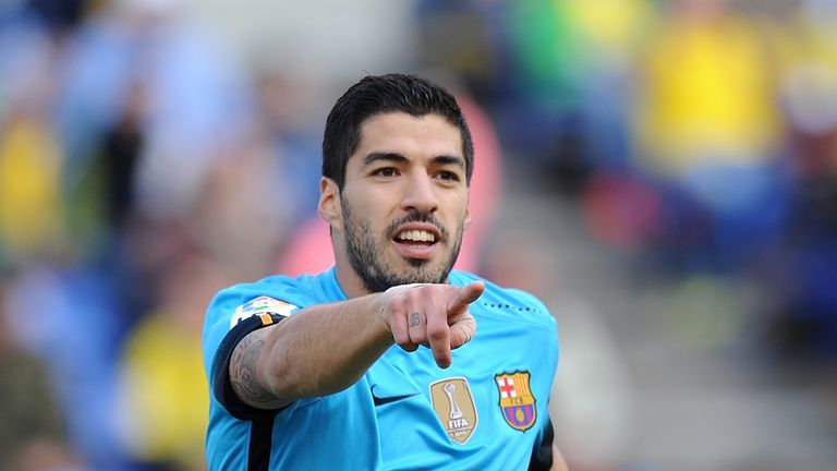 Luis Suarez of FC Barcelona celebrates after scoring his team's opening goal against Las Palmas 