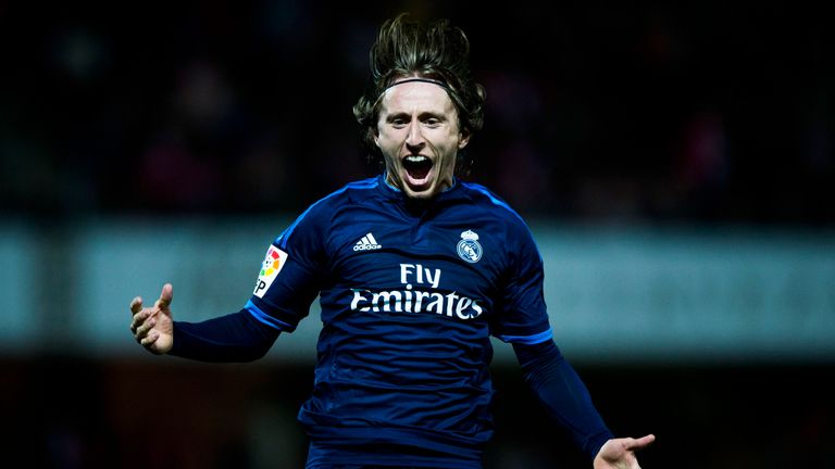 Luka Modric of Real Madrid celebrates scoring their winning goal