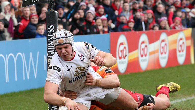 Ulster's Luke Marshall goes over for a try before being bundled into touch