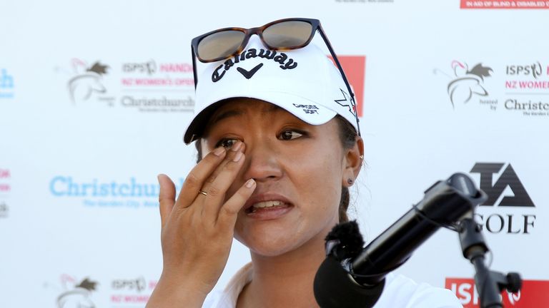 Lydia Ko wipes away tears after winning the New Zealand Women's Golf Open