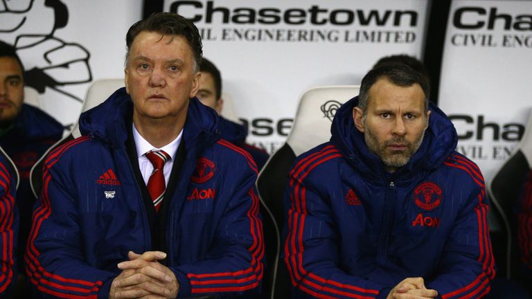 Louis van Gaal manager of Manchester United (L) and assistant coach Ryan Giggs (R) look on prior to during the Emirates FA Cu
