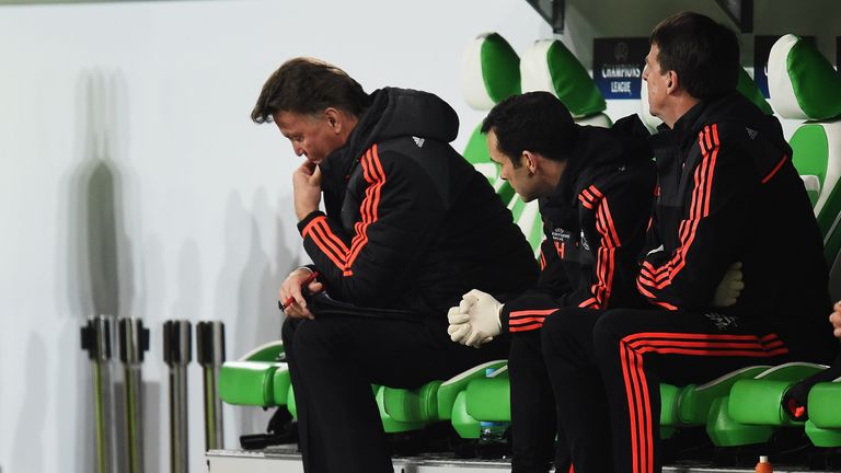 Louis van Gaal looks dejected after Manchester United crashed out of the Champions League