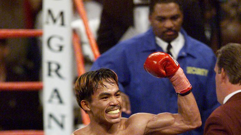 23 Jun 2001:  Manny Pacquiao celebrates his victory over Lehlohonlo Ledwaba from South Africa during the IBF Super Bantamweight Champi