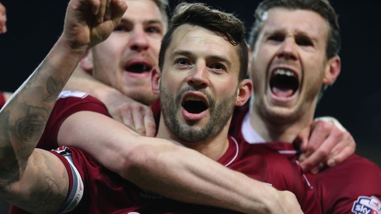 Marc Richards of Northampton Town celebrates after scoring
