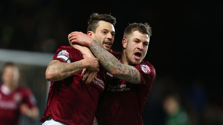 Marc Richards of Northampton Town celebrates with team mate James Collins 
