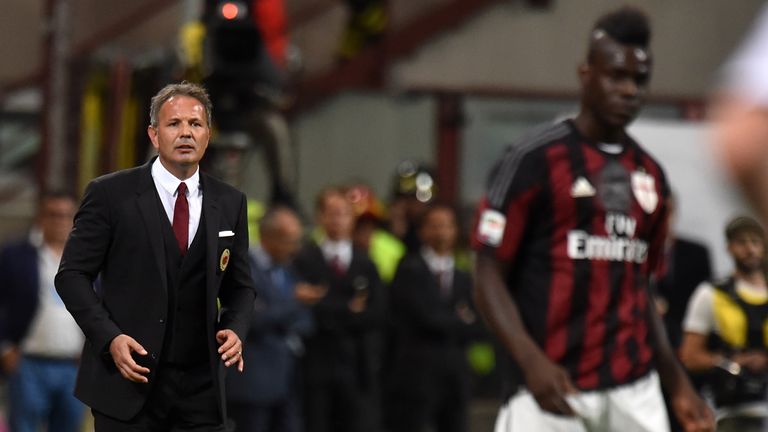  Head Coach Sinisa Mihajlovic of Milan and  Mario Balotelli look on during the Serie A match between AC Milan and US Citta di 