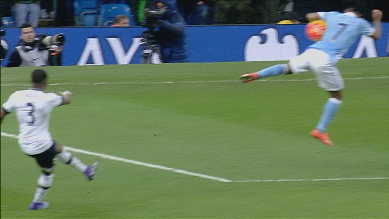 The ball hits Raheem Sterling in the armpit, and referee Mark Clattenburg gives a penalty