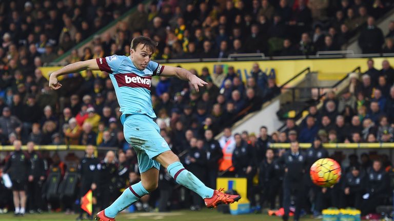 Mark Noble of West Ham United scores his team's second goal at Norwich