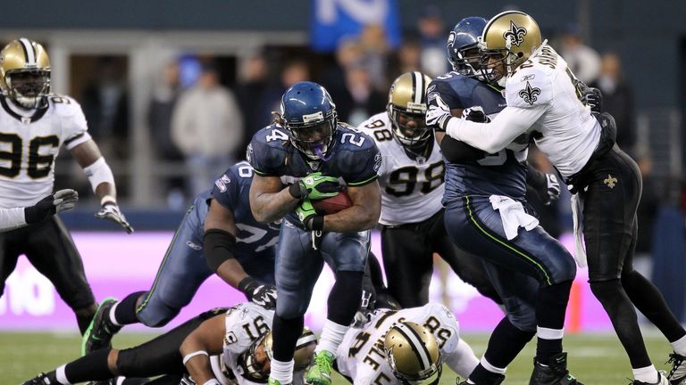 Marshawn Lynch #24 of the Seattle Seahawks runs for a 67-yard touchdown run in the fourth quarter against the New O