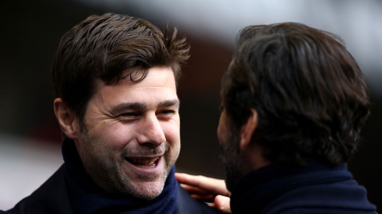 Mauricio Pochettino (L) Manager of Tottenham Hotspur and Quique Flores (R) manager of Watford greet prior to the Barclays Premier League match