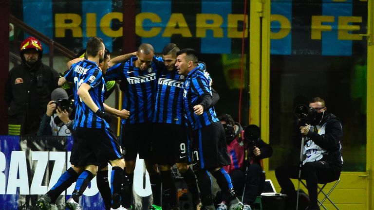 Inter Milan's forward from Argentina Mauro Icardi celebrates with teammates after scoring during the Serie A football match Inter Milan vs Chievo Verona