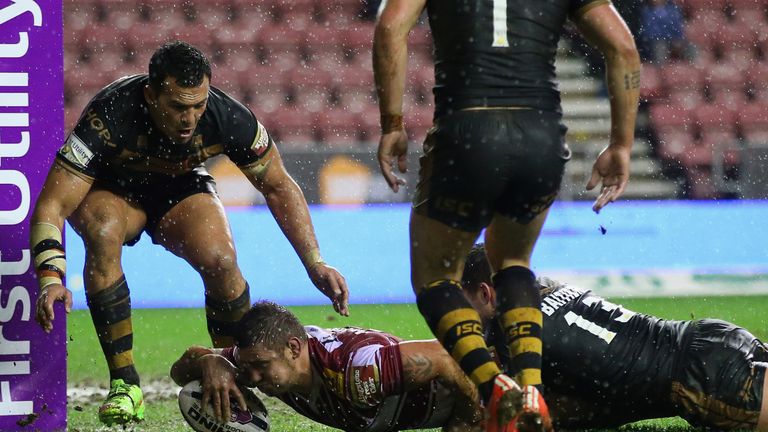 Michael McIlorum of Wigan Warriors scores the second try during the Super League match between Wigan and Catalans Dragons