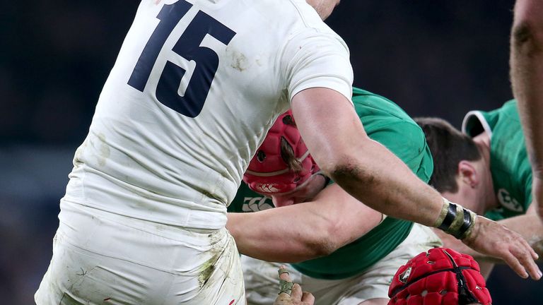  Mike Brown looking to hack the the ball away against Ireland 