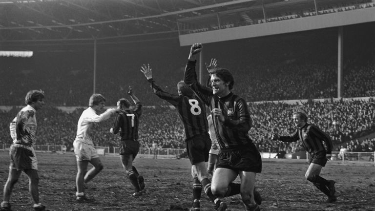 Manchester City's Mike Doyle (front) and his team-mates celebrate Doyle's equaliser