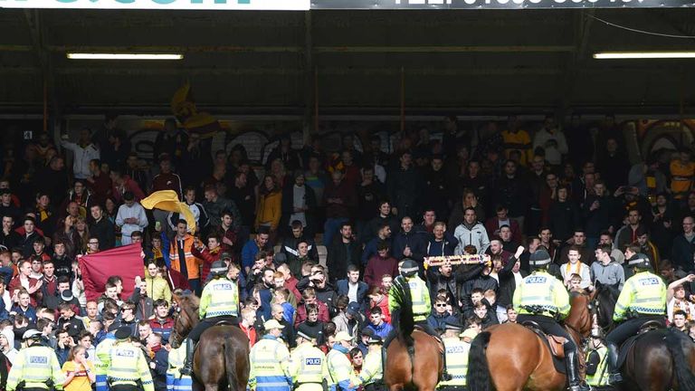 Mounted police on Fir Park pitch after the play-off against Rangers