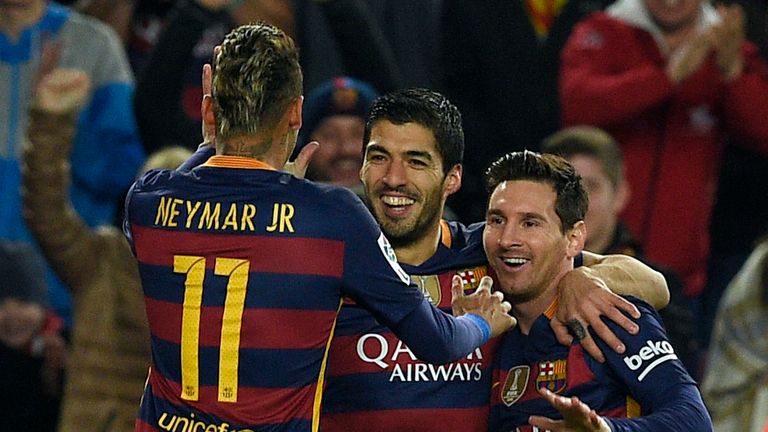 Neymar, Luis Suarez and Lionel Messi celebrate