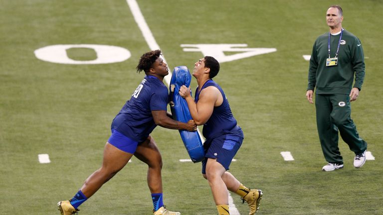 Offensive linemen Andrus Peat (right) of Stanford competes with Robert Myers of Tennessee State during the 2015 NFL Scoutin