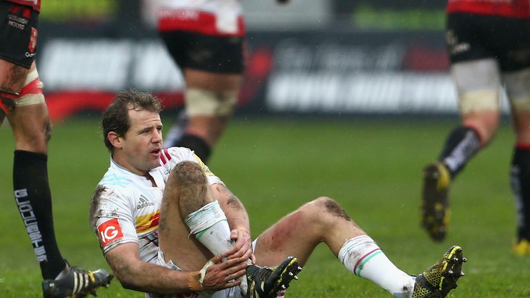 Nick Evans holds his ankle before leaving the field with an injury on Saturday