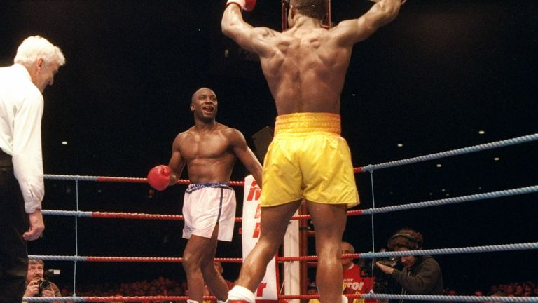 Nigel Benn and Chris Eubank in action during a bout. Mandatory Credit: Holly Stein  /Allsport