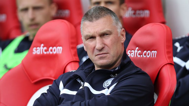 Leicester City's English manager Nigel Pearson watches his players