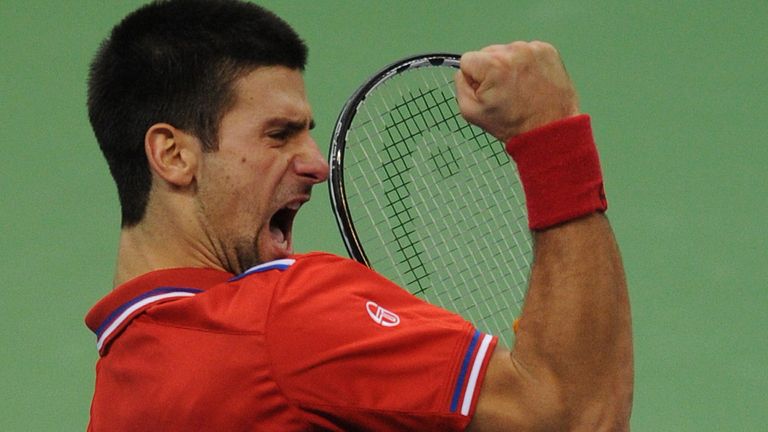 Serbia's Novak Djokovic celebrates beating Gael Monfils in the 2010 Davis Cup final