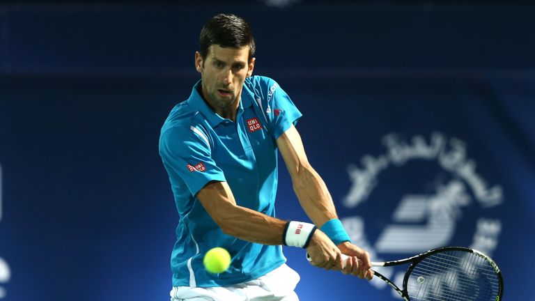 DUBAI, UNITED ARAB EMIRATES - FEBRUARY 22:  Novak Djokovic of Serbia in action against Tommy Robredo of Spain during day two of the ATP Dubai Duty Free Ten