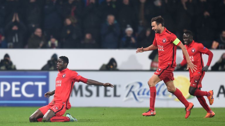 HERNING, DENMARK - FEBRUARY 18:  Paul Onuachu (L) of FC Midtjylland celebrates scoring his team's second goal during the UEFA Europa League round of 32 fir