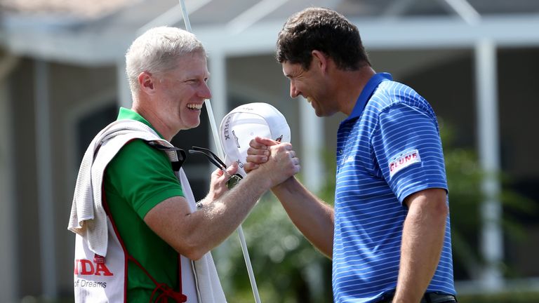 PALM BEACH GARDENS, FL - MARCH 02:  Padraig Harrington (R) of Ireland celebrates with his caddie after winning on the second playoff hole during the contin