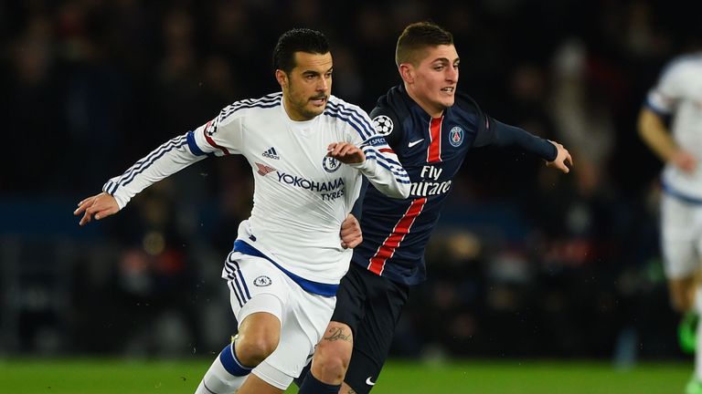 Marco Verratti of Paris Saint-Germain (right) and Pedro of Chelsea battle for the ball
