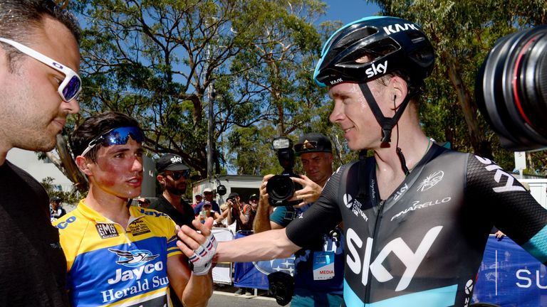 Britain's Peter Kennaugh (2nd L) and Chris Froome of Team Sky 