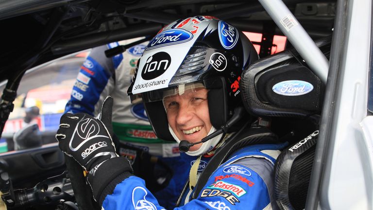 Petter Solberg of Norway in the service park during Day One of the WRC Wales Rally GB 