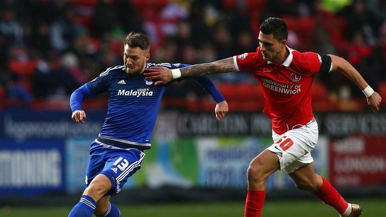 Cardiff's Anthony Pilkington (L) is challenged by Jorge Teixeira of Charlton