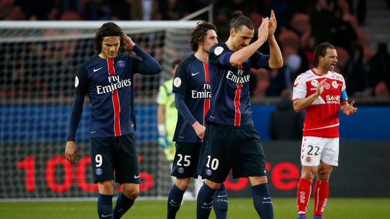 Paris Saint-Germain's Swedish forward Zlatan Ibrahimovic (R) celebrates with teammates after scoring a goal during 